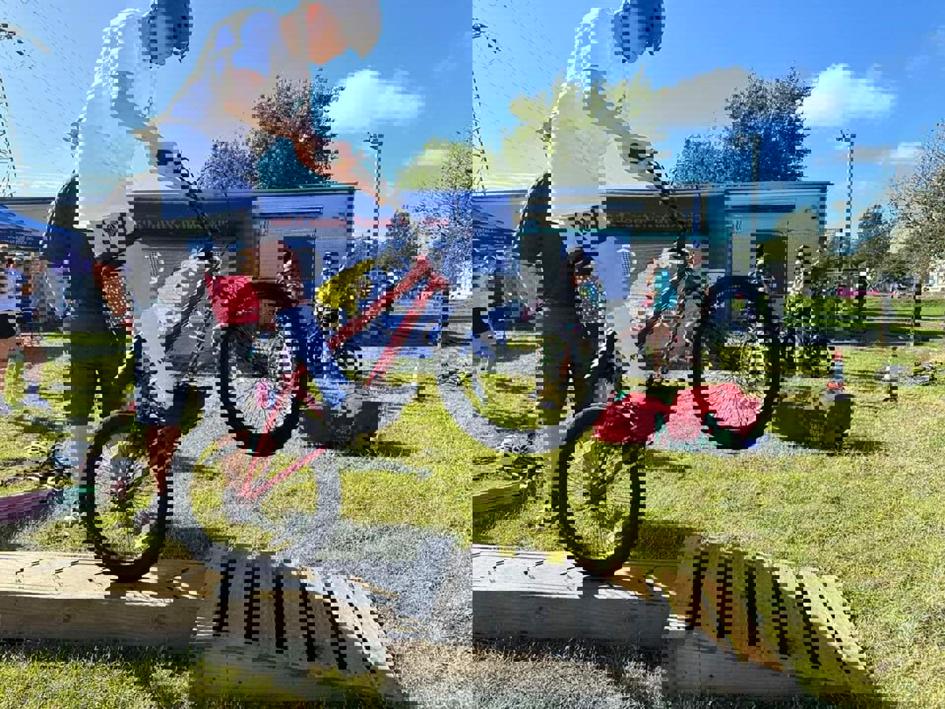A child does tricks on a bike at Wildmill Community Centre