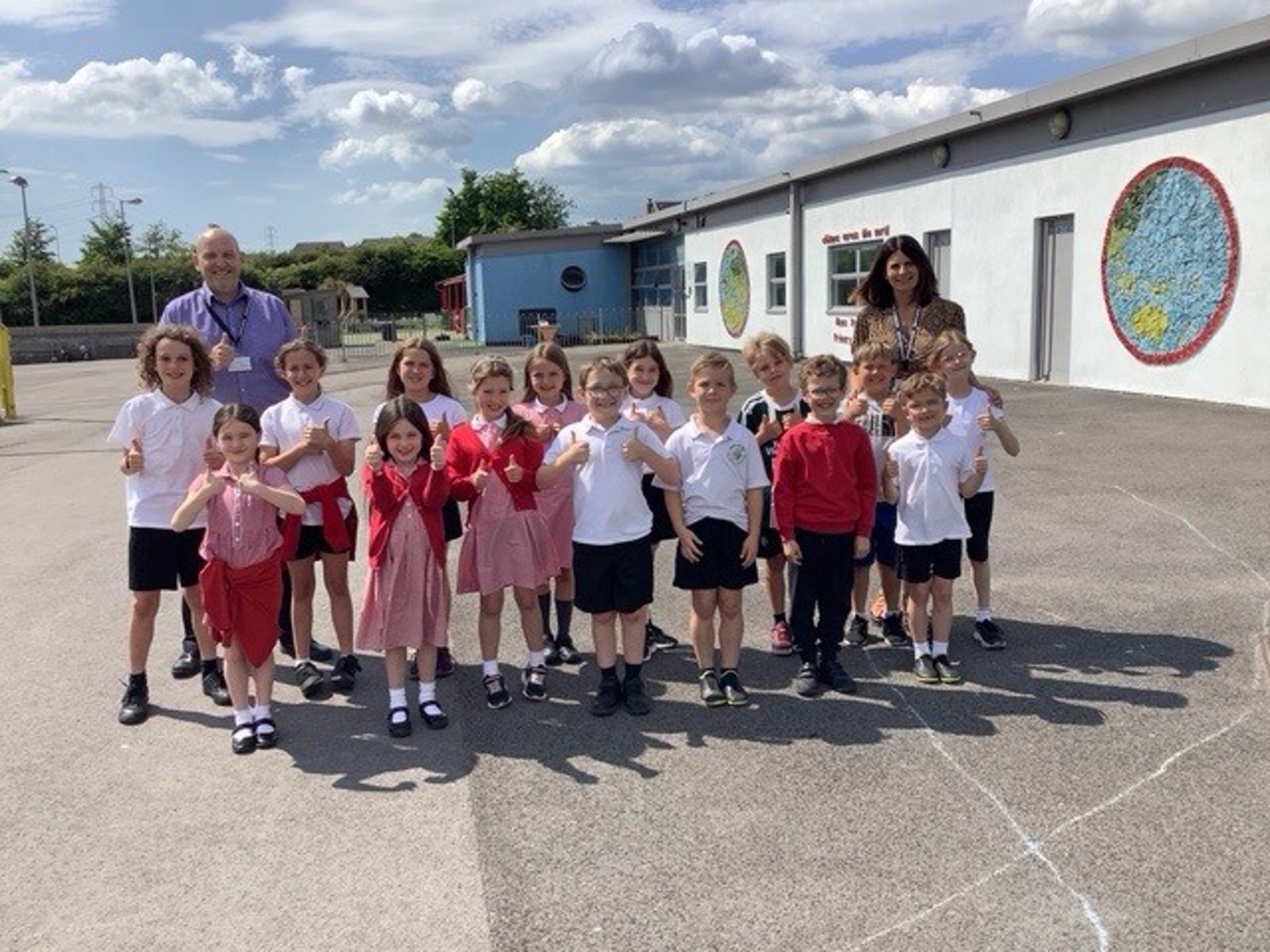 Image: Headteacher, Kevin Stroud, with Deputy Headteacher, Claire Merfield, and members of the school council.