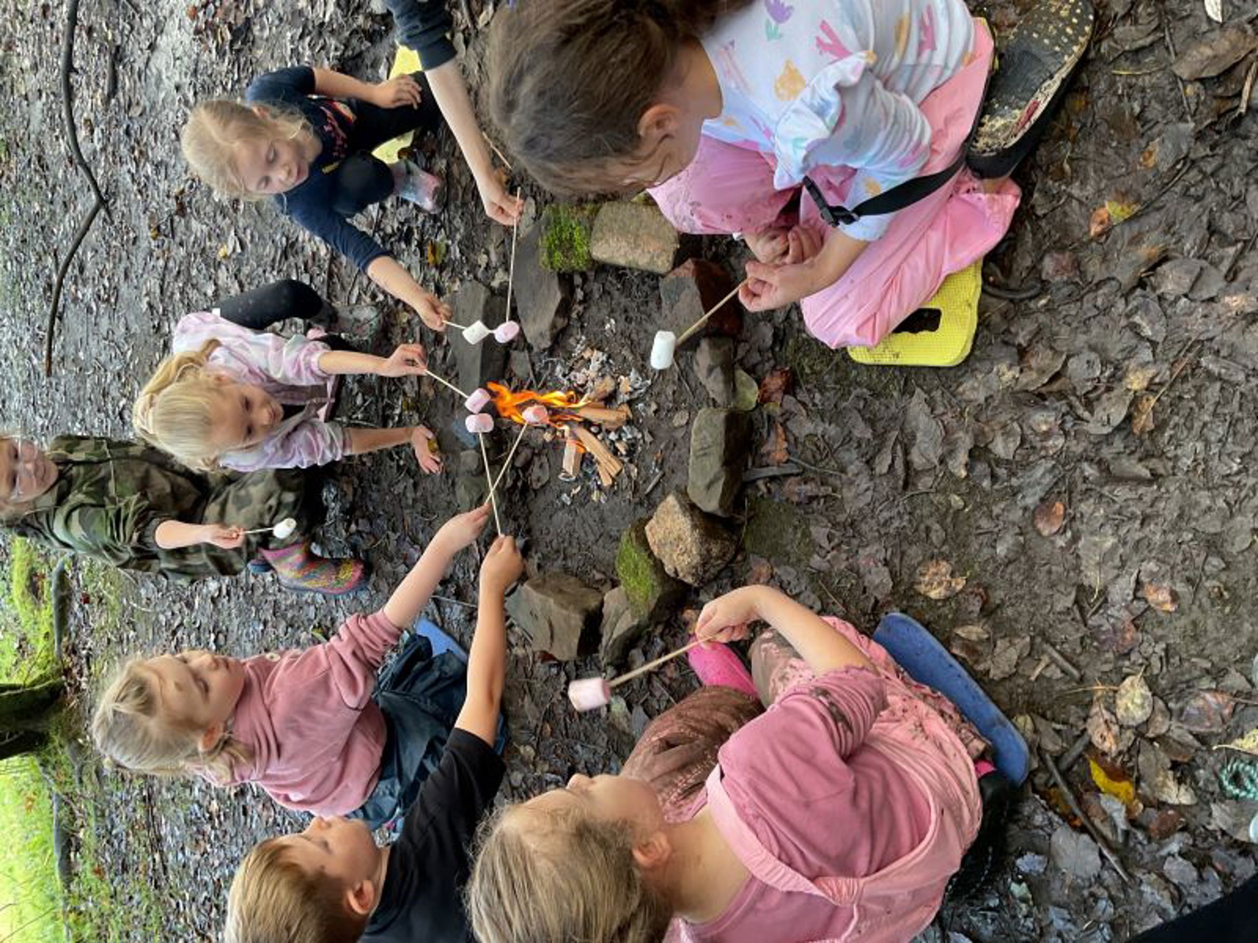 Ffaldau pupils roast marshmallows over a fire