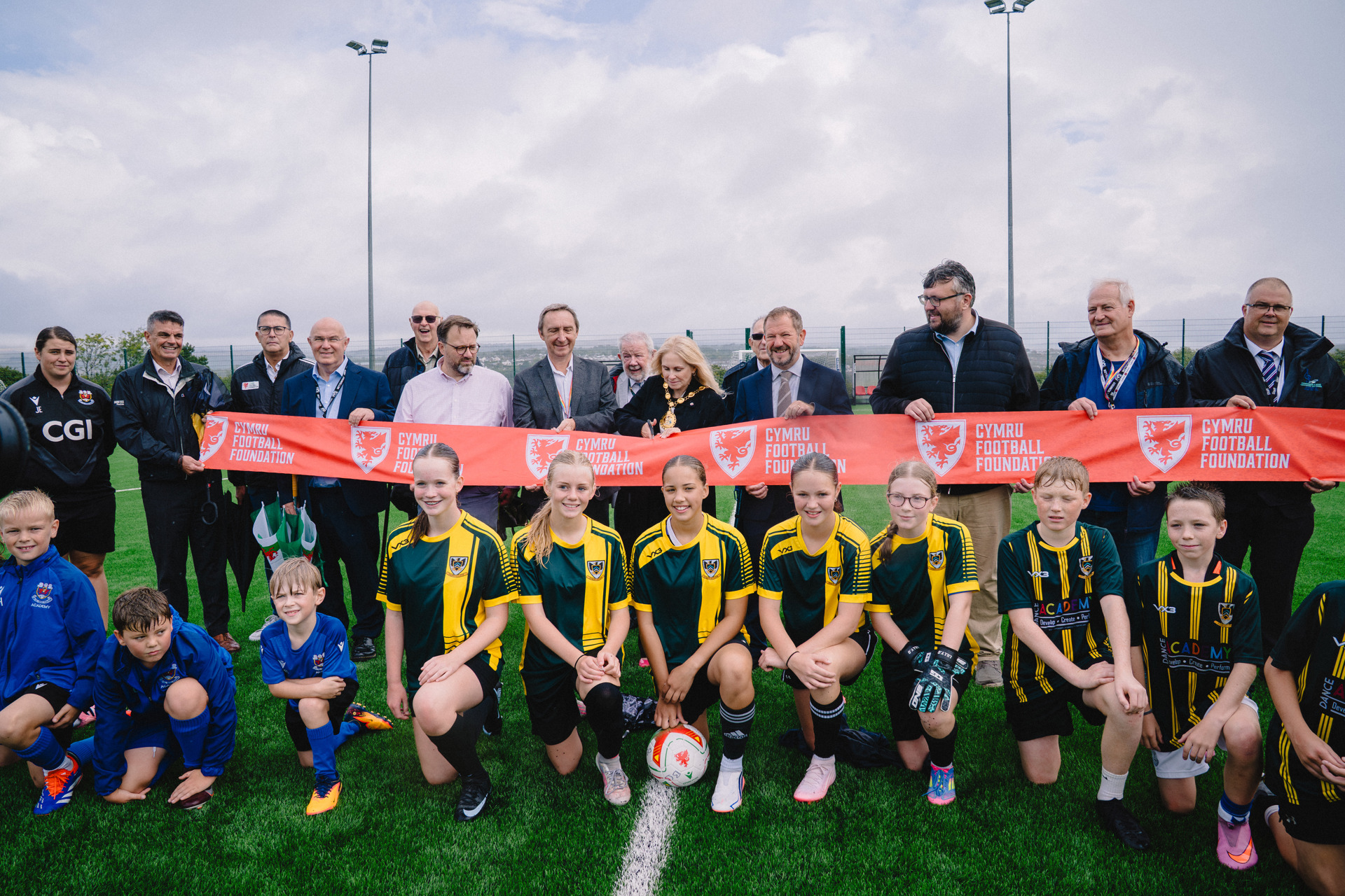 Local children and councillors gathered for the official opening of the pitch.