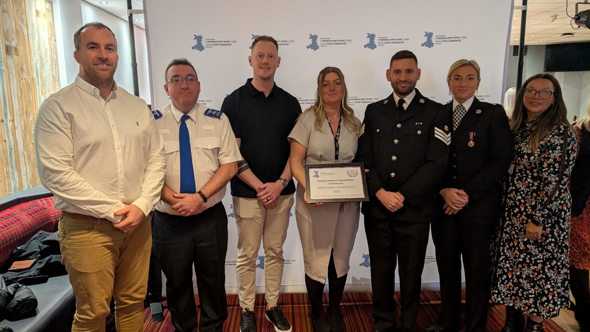 (from left to right): Tom Sloane, Osprey’s Community Rugby Officer, PCSO Steve Bowen, Nick White, Foundation Manager for Ospreys in the Community, Gemma Shore, Senior Development Worker (BYS - Bridgend Youth Service), Sergeant Dan Parry, PCSO Jesci Hare, and Tanya Hillman, Post-16 NEET Co-ordinator (BYS)