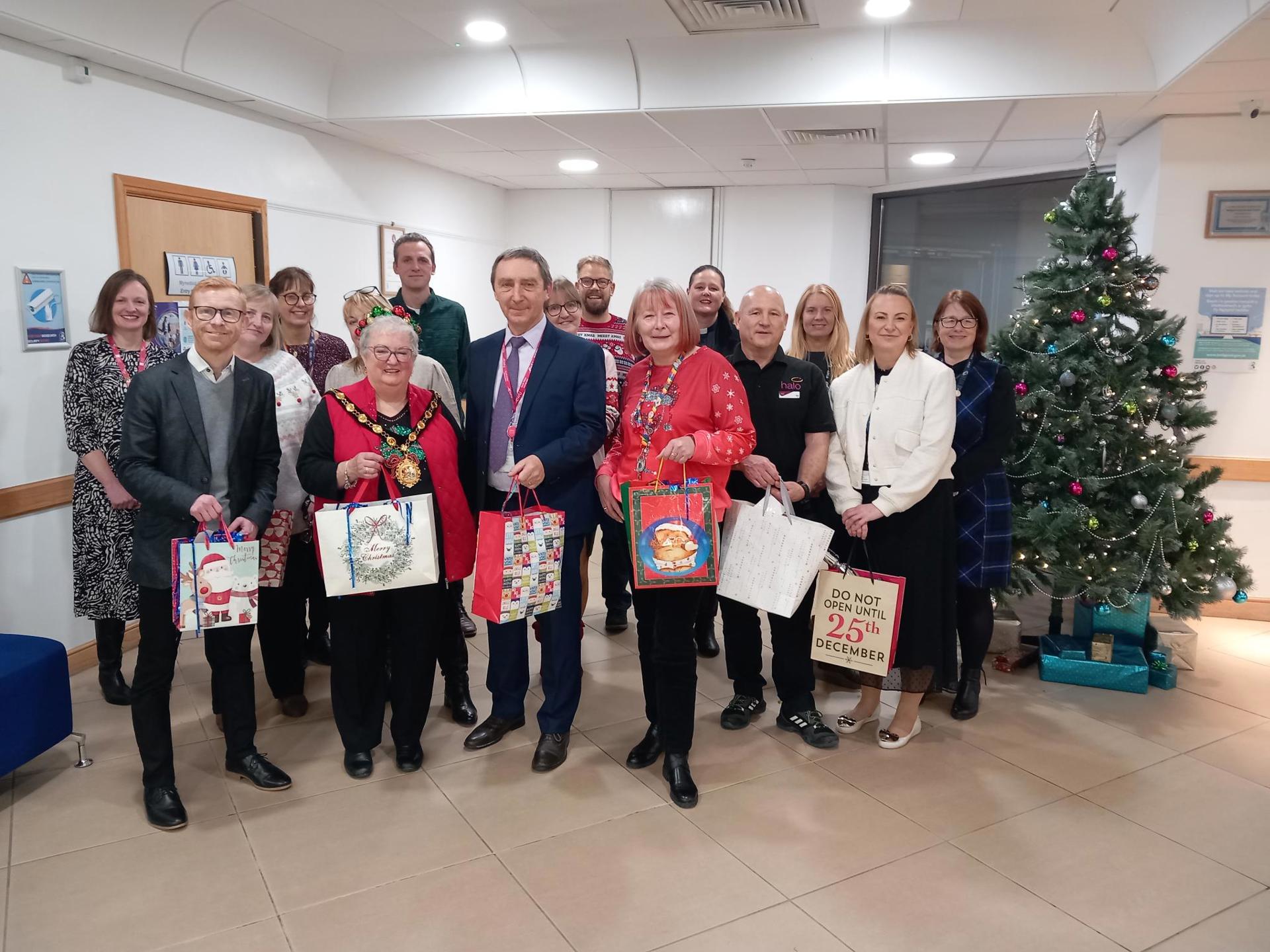 Council Leader, Cllr John Spanswick, Deputy Leader, Cllr Jane Gebbie, Mayor of Bridgend County Borough, Cllr Heather Griffiths with partners from Awen Cultural Trust, Halo Leisure and Bridgend College pictured with Craig Hopkins from Brackla Tabernacle.