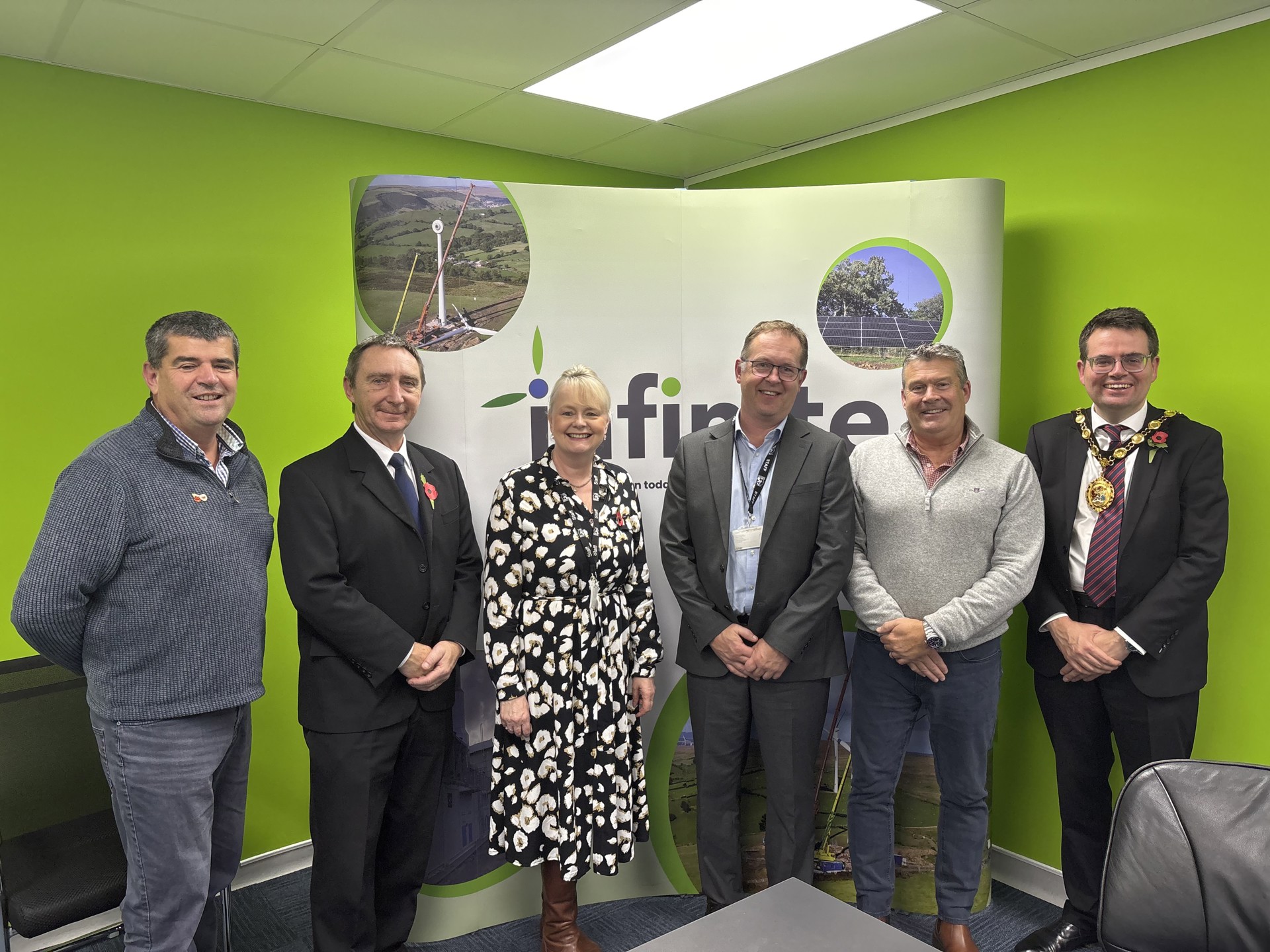 (L-R) Iestyn Morgan, Director at Infinite Renewables, John Spanswick, Leader of Bridgend County Borough Council, Tracy Mortimer, Local Enterprise Coordinator at Bridgend County Borough Council, Simon Richards, Local Enterprise Coordinator at Bridgend County Borough Council, Andrew Crossman, Director at Infinite Renewables and Councillor Huw David, Mayor of Bridgend County Borough at a recent visit to Infinite Renewables Ltd.
