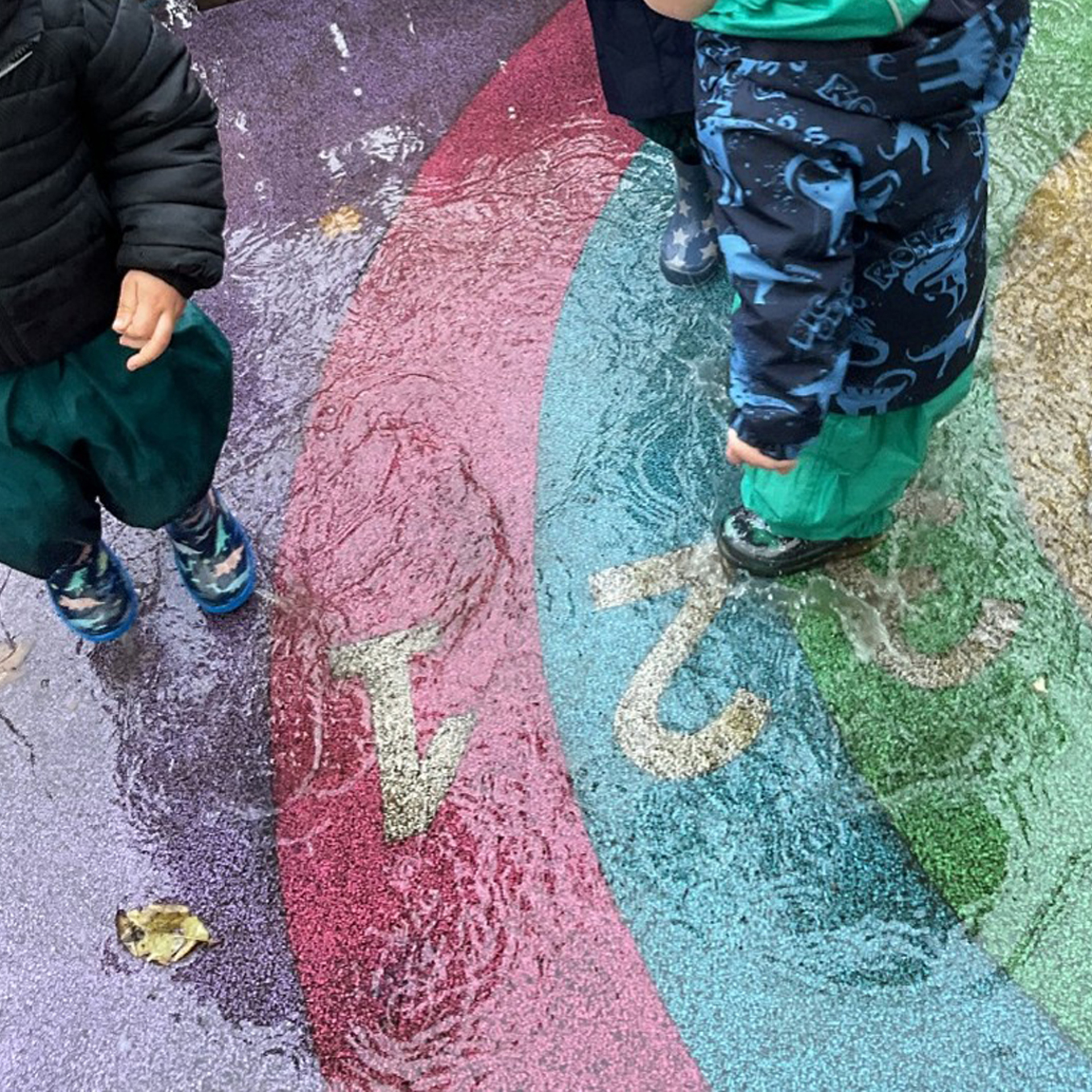 Children playing in rain