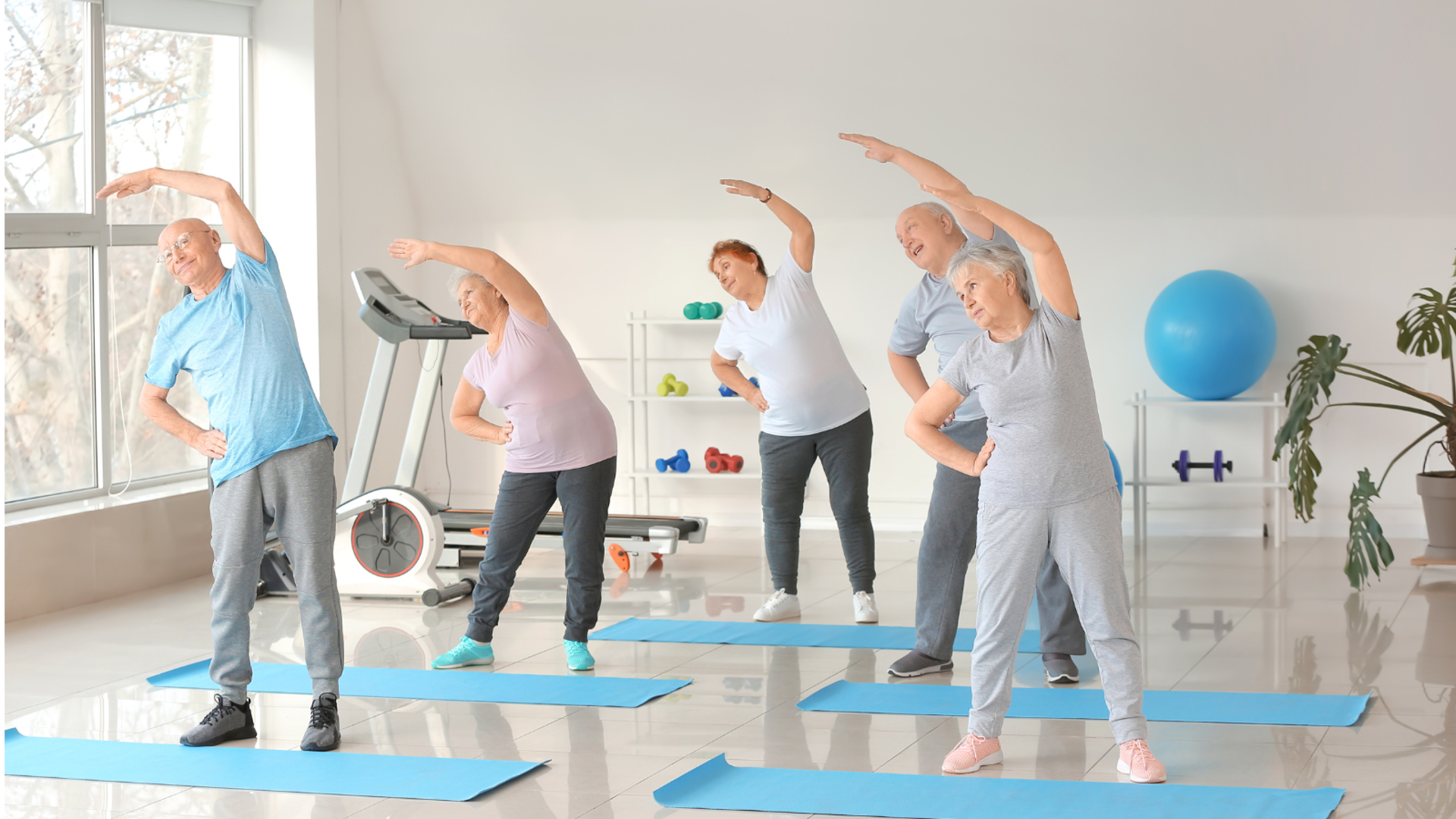 Elderly people practicing Yoga