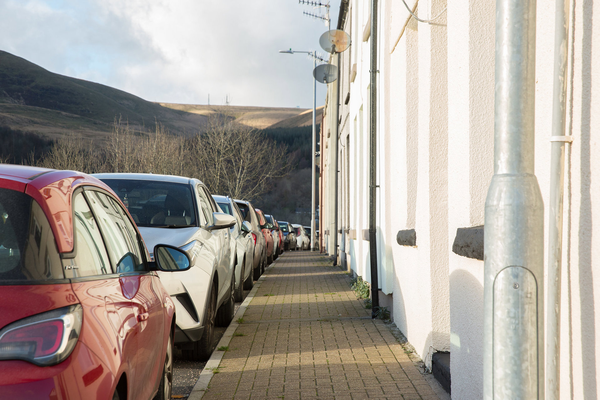Cars parked along a street