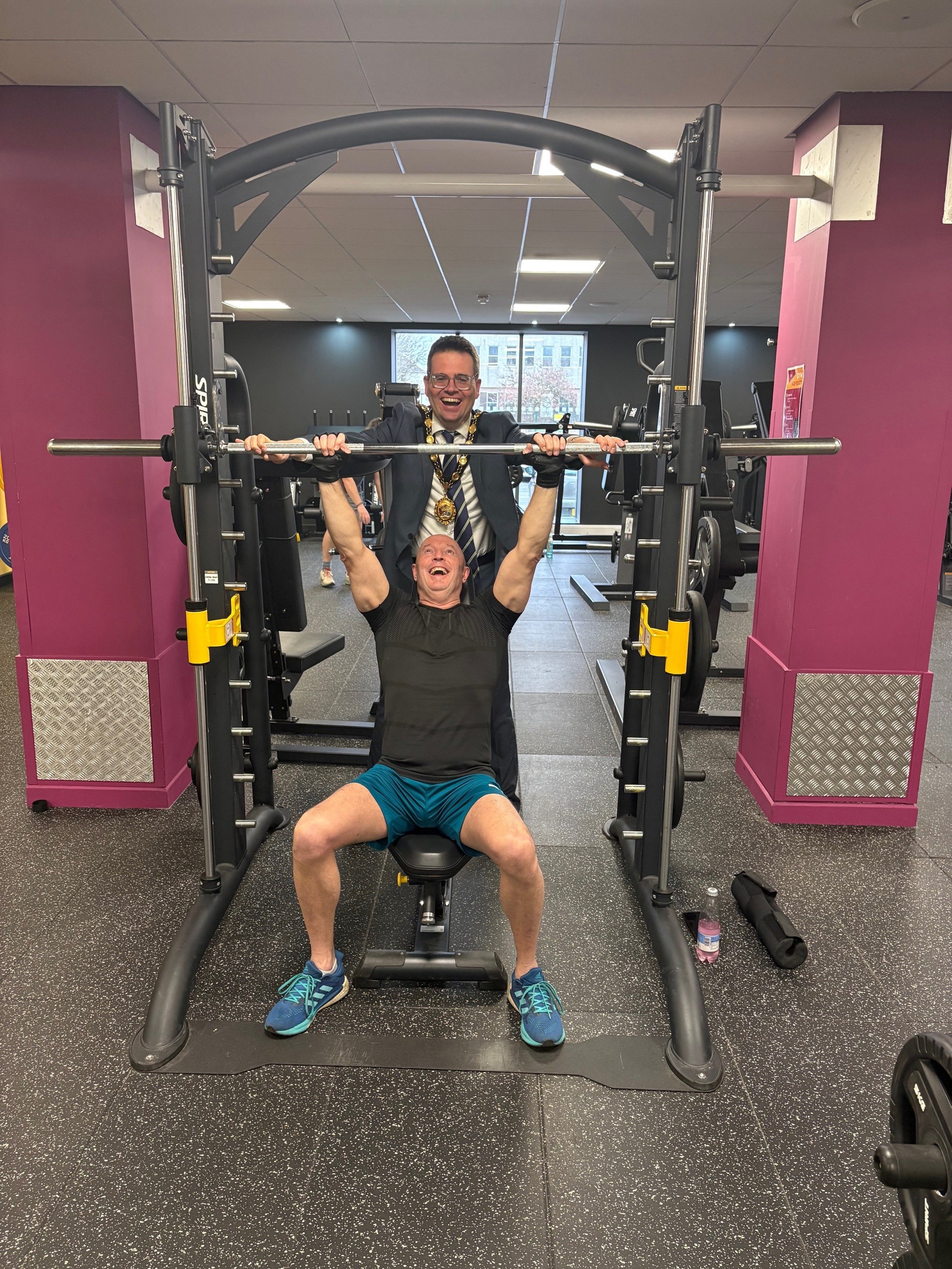 Mark Pearce pictured with the Mayor, Cllr Huw David, using the gym equipment.