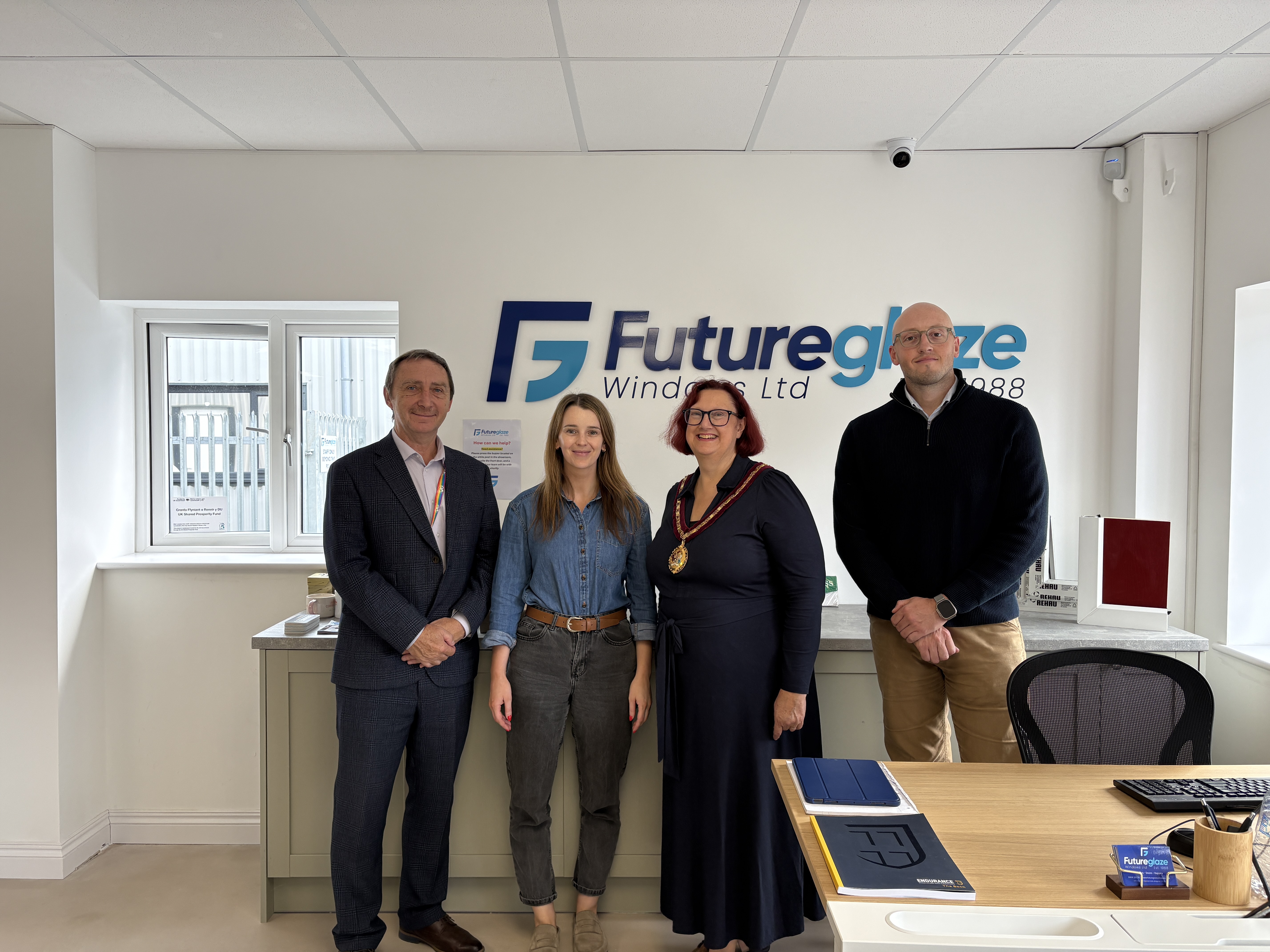 (L-R) Councillor John Spanswick, Leader of Bridgend County Borough Council, Rebecca Dean, Managing Director at Futureglaze Windows, Councillor Elaine Winstanley, Deputy Mayor of Bridgend County Borough Council and Tom Robinson, Director at Futureglaze Windows at a recent visit at the premises on Ewenny Industrial Estate, Bridgend.