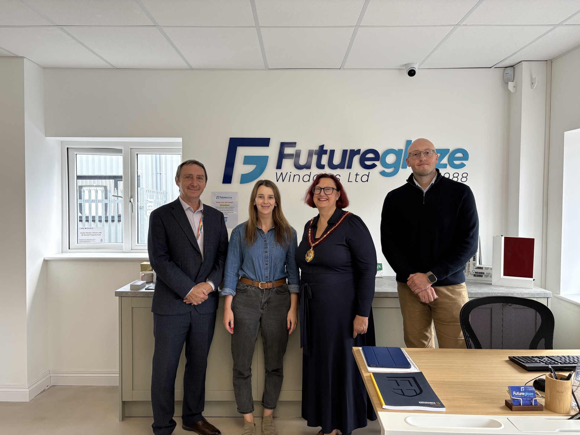 (L-R) Councillor John Spanswick, Leader of Bridgend County Borough Council, Rebecca Dean, Managing Director at Futureglaze Windows, Councillor Elaine Winstanley, Deputy Mayor of Bridgend County Borough Council and Tom Robinson, Director at Futureglaze Windows at a recent visit at the premises on Ewenny Industrial Estate, Bridgend.