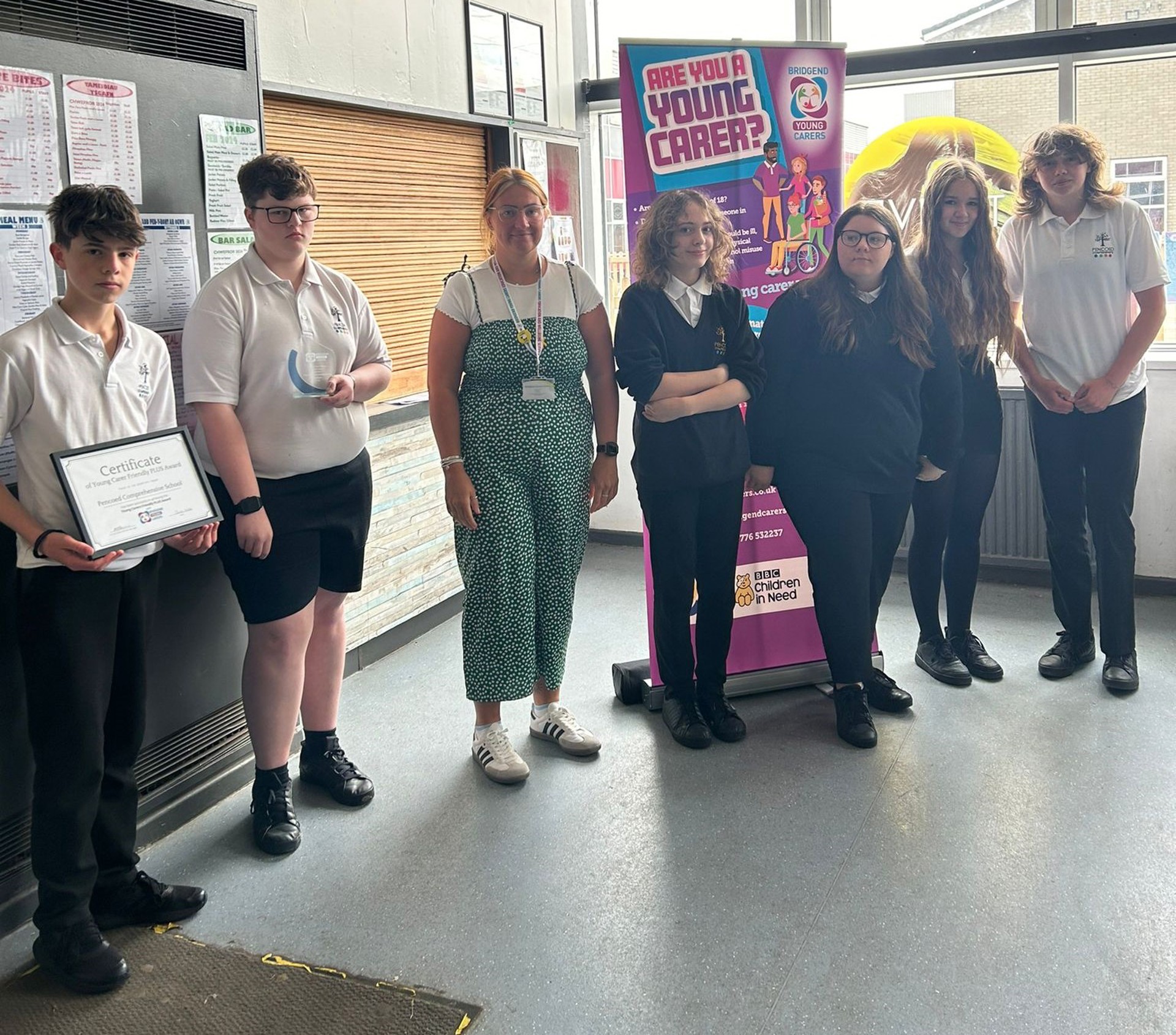 Pencoed Comprehensive School's Young Carers Group pose with the award