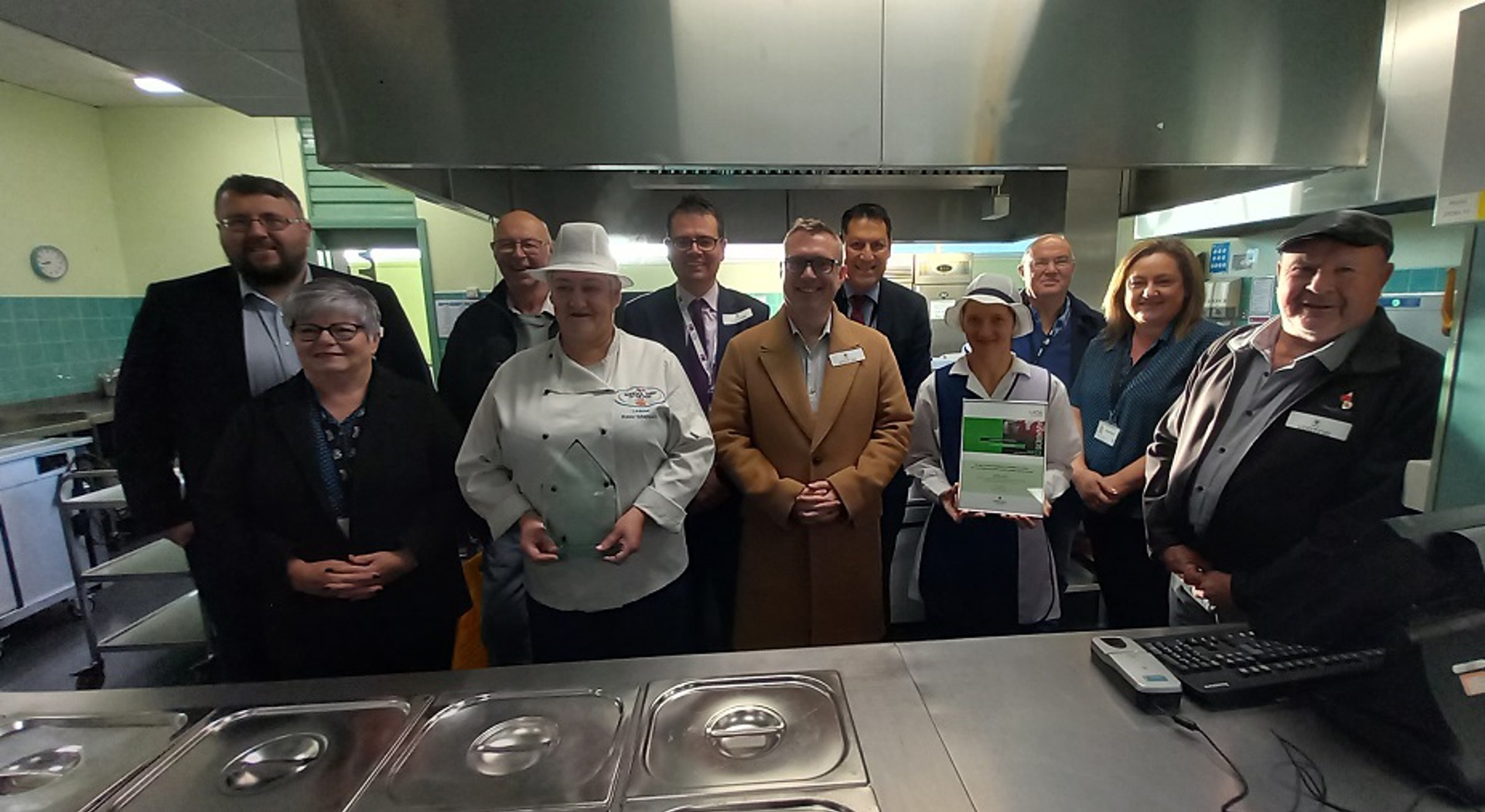 Bryntirion Comprehensive catering staff pose with award