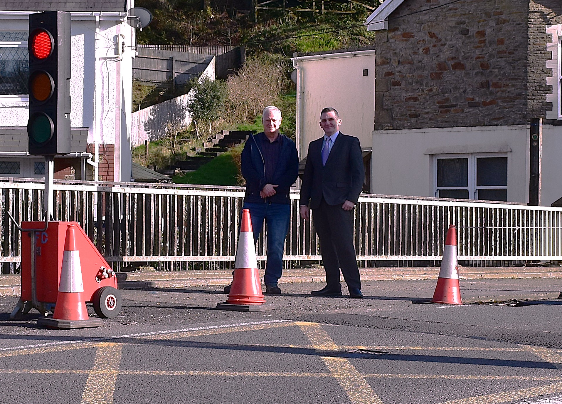 Cabinet members Gary Haines and Eugene Caparros visit the A4061 river bridge at Blackmill, which is due to be replaced with a brand new deck as part of a £5m initiative.