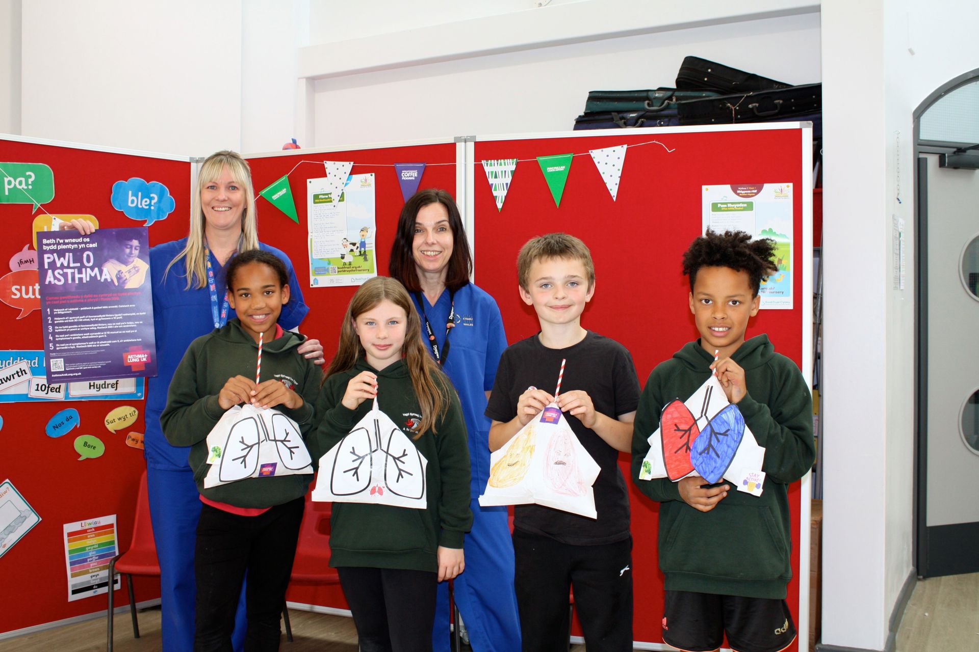 Pupils pose with Asthma and Lung Cymru staff