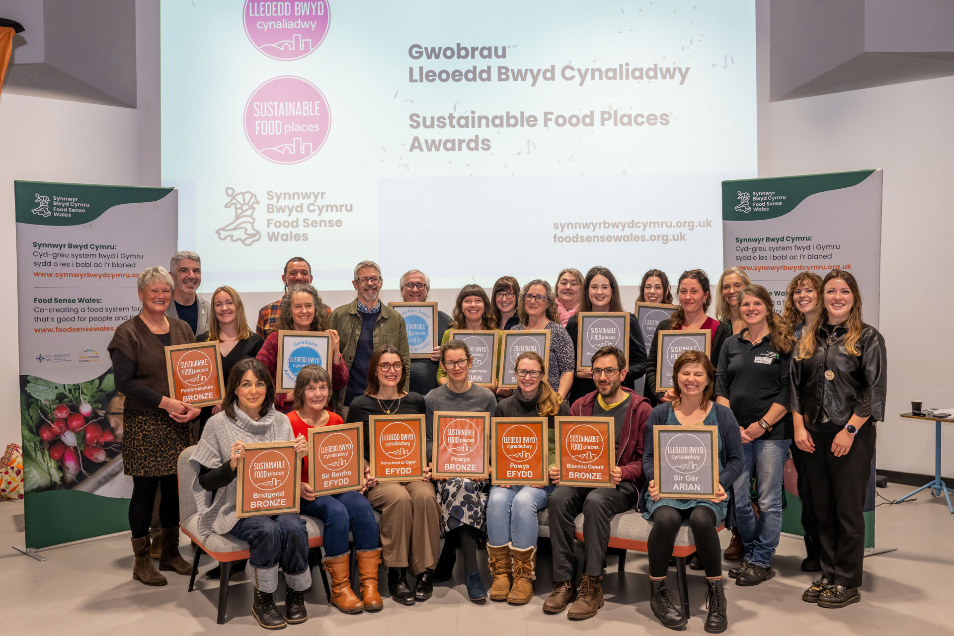 Local Food Partnerships from across Wales receiving Sustainable Food Places award at the Wales Real Food & Farming Conference in Bridgend College, Pencoed. 