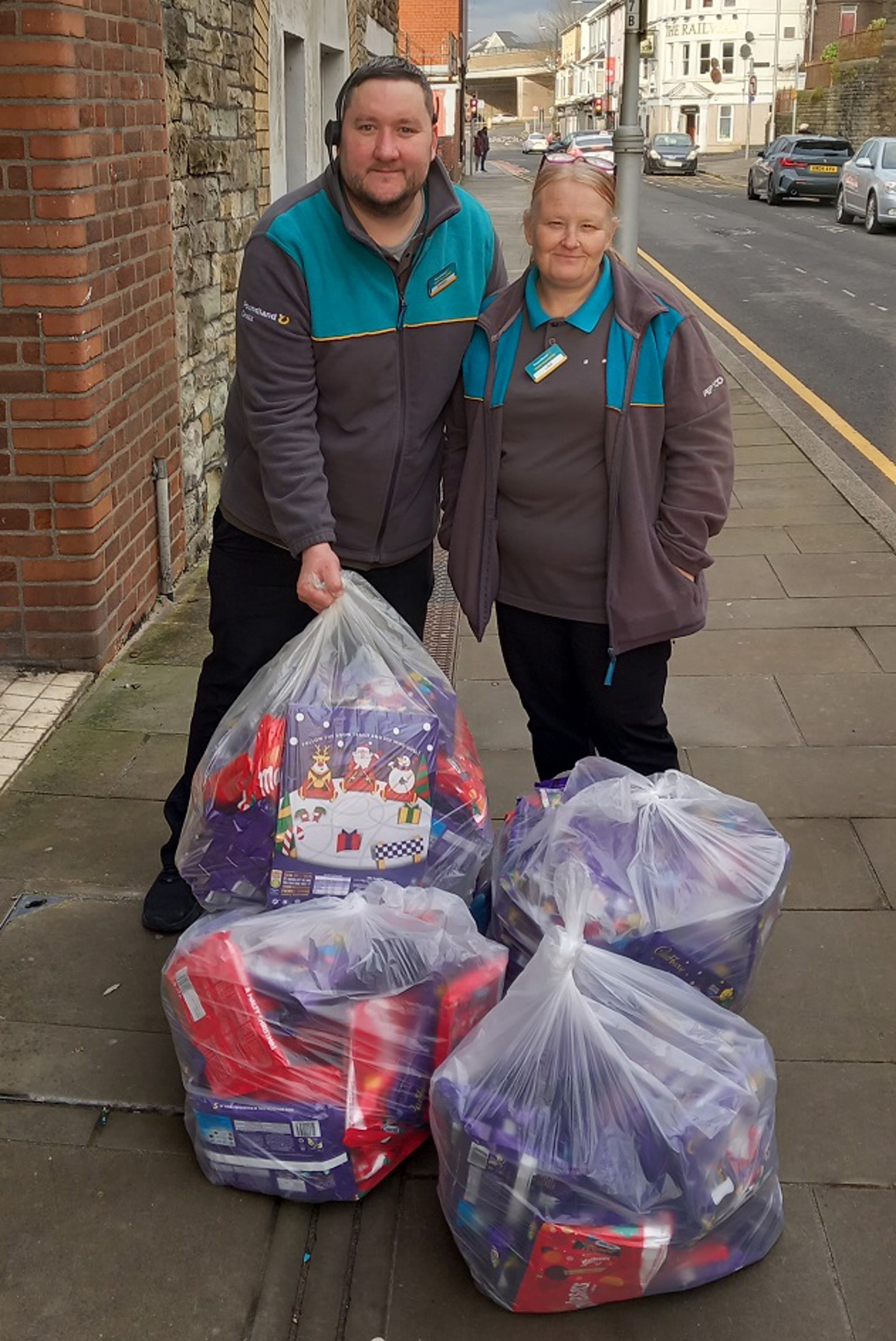 Staff at Poundland, Bridgend with their donations.